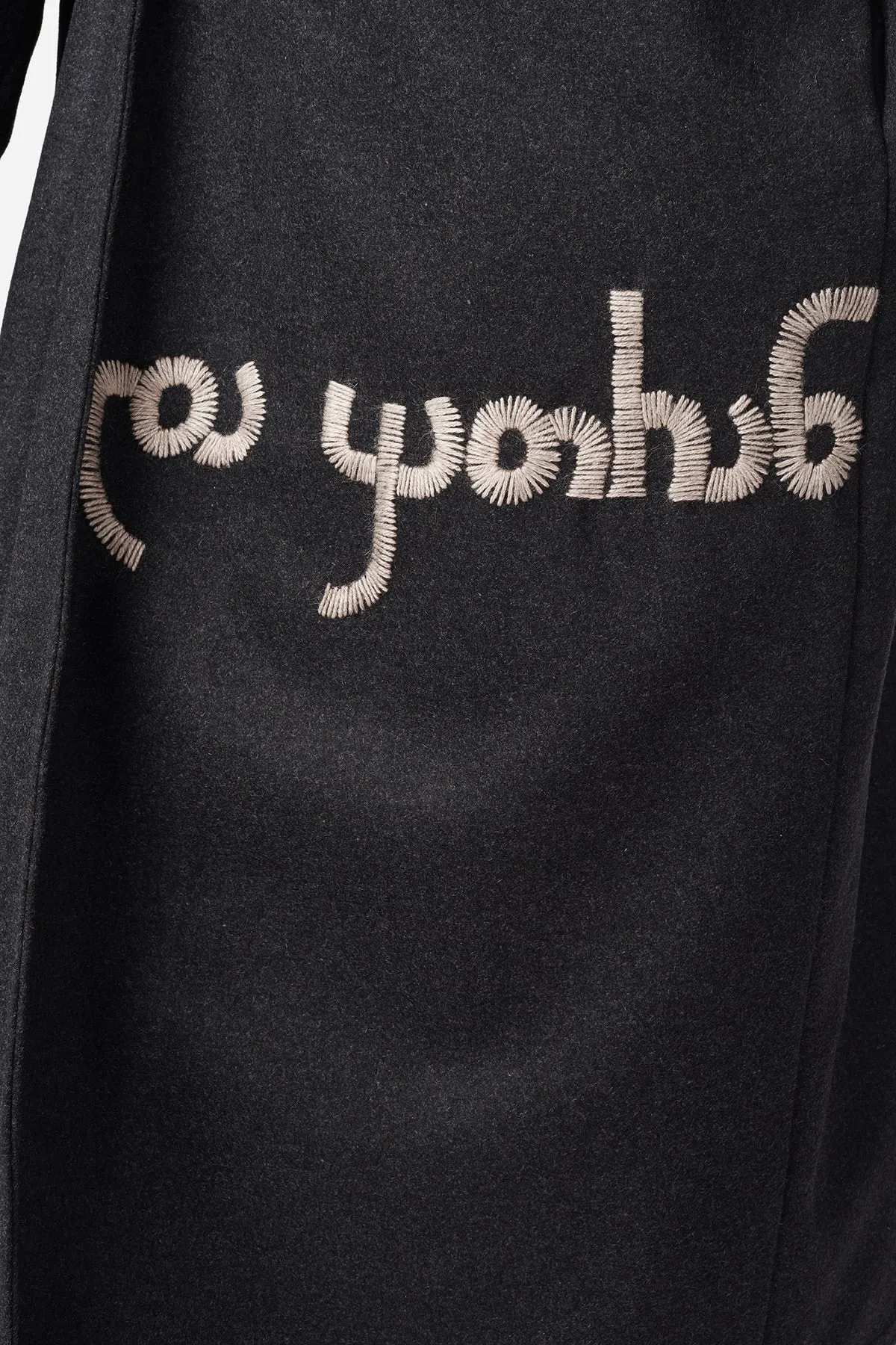 Wool coat with handmade embroidery